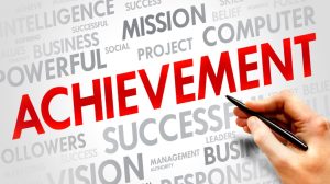 What are Greg Jackson's Key Achievements